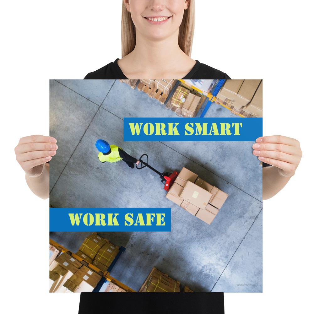 A safety poster showing a bird's-eye view of a worker in a warehouse pulling boxes on a pallet jack with the slogan work smart, work safe.