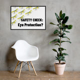 An eye safety poster depicting many clear safety glasses with yellow trim neatly lined up in rows and rows with a safety slogan in the foreground.