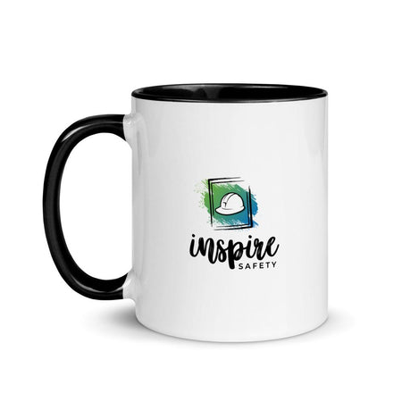 White ceramic mug with the phrase "A great safety culture is when people continue to work safely and do the right thing... even when no one is watching" in a simple black text across the side with the Inspire Safety logo on the other side, with a black rim, inside, and handle.