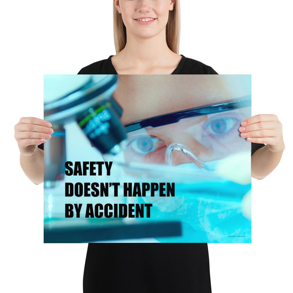 Safety poster of a close up of a woman's eyes wearing safety glasses inspecting a sample on a microscope with safety slogan written at the bottom.