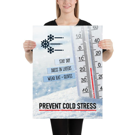 A safety poster showing a close-up of a thermometer stuck in the snow outside reading a freezing cold temperature with the slogan stay dry, dress in layers, wear a hat and gloves, prevent cold stress.