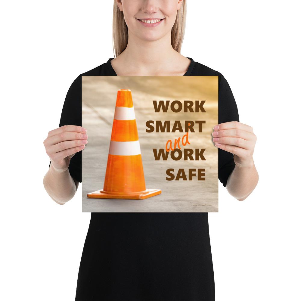 A safety poster showing a close-up of an orange traffic cone with the slogan work smart and work safe.