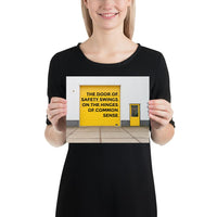 Workplace safety poster depicting a bright yellow garage door to a warehouse with a bold safety slogan on it with a smaller yellow door to the right.