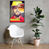 A workplace safety poster showing a portrait of a man wearing a hardhat and safety glasses with a magnifying glass magnifying one eye with the slogan, keep an eye out for safety, don't get blinded by bad habits.