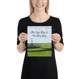 A safety poster showing an oil rig in a beautiful landscape scene of a field with vivid green grass and a bright blue sky with the slogan the safe way is the only way.