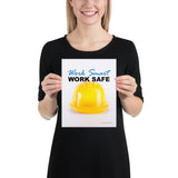 A safety poster showing a close-up of a yellow hard hat on a white background with the slogan work smart and work safe.
