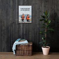 A safety poster showing two workers in reflective vests collaborating on a construction site with the proverb to know the road ahead ask those coming back.