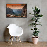 A safety poster showing a landscape of burnt orange tinted mountains with the sunlight piercing through the tops of the mountains with the quote our plans for the future descend from the past by Seneca.