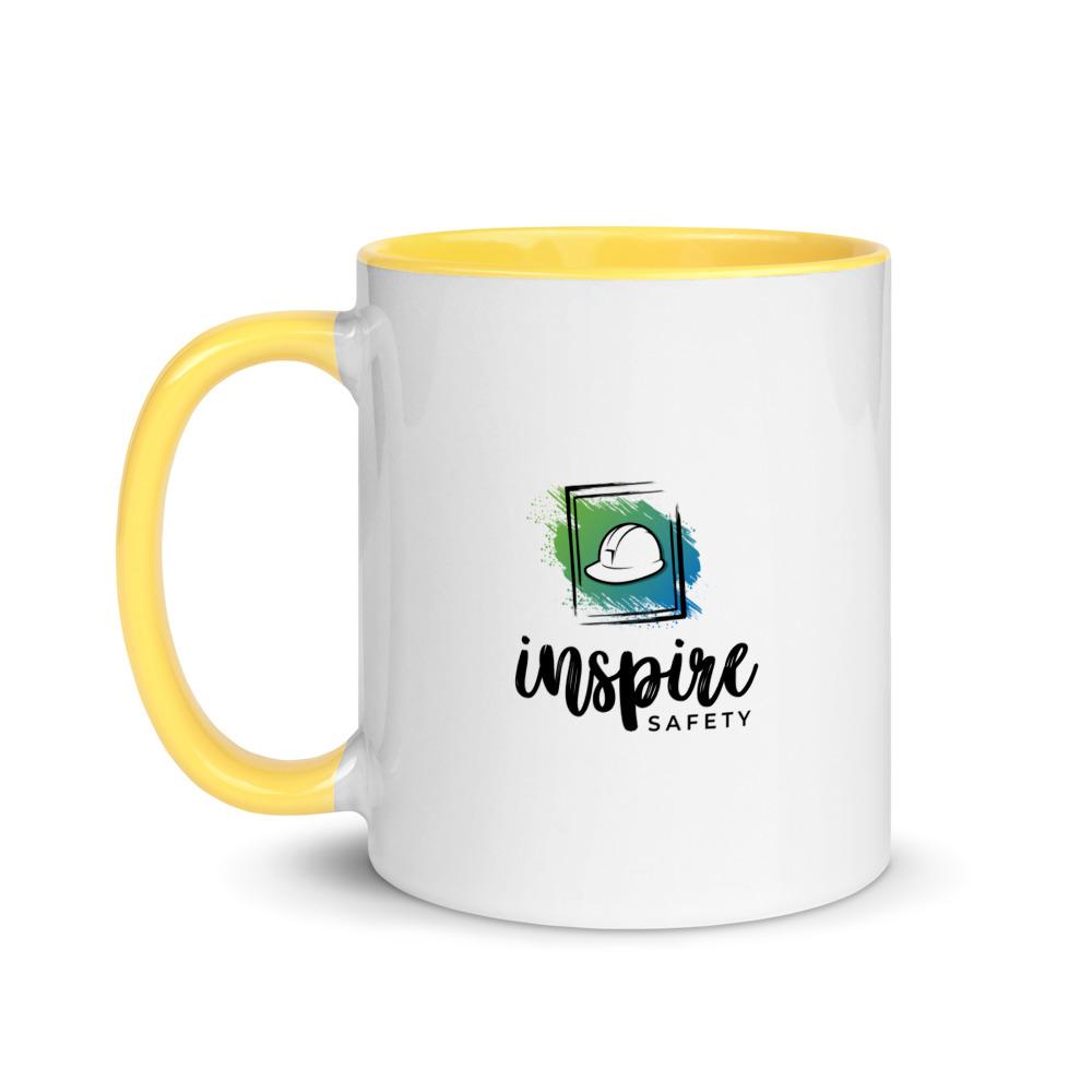 White ceramic mug with the phrase "A great safety culture is when people continue to work safely and do the right thing... even when no one is watching" in a simple black text across the side with the Inspire Safety logo on the other side, with a yellow rim, inside, and handle.