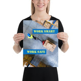 A safety poster showing a bird's-eye view of a worker in a warehouse pulling boxes on a pallet jack with the slogan work smart, work safe.