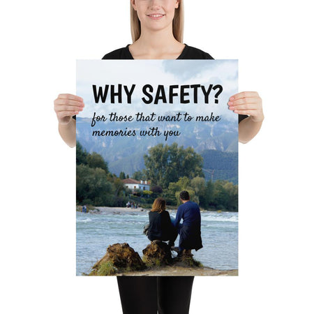 A workplace safety poster showing a couple sitting on some rocks overlooking a river with a mountainous landscape in the background with the slogan why safety? for those that want to make memories with you.