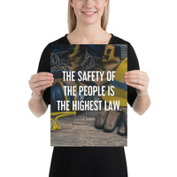 A safety poster showing a close-up of various PPE including safety glasses, ear muffs, gloves, a hard hat, and work boots with the quote by Cicero in the foreground.