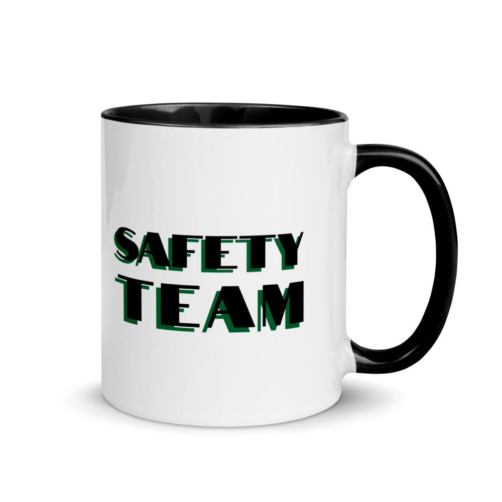 White ceramic mug with "Safety Team" in bold text across the side, with black color on the inside, the rim, and the handle.