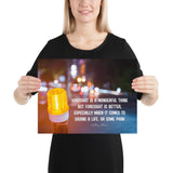 A workplace safety poster depicting a bright orange construction traffic light in the foreground of a blurry nighttime cityscape with a safety quote by William Blake.