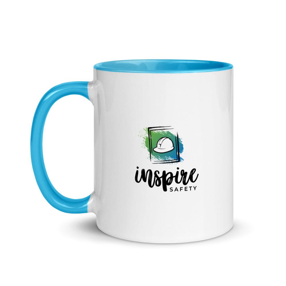 White ceramic mug with the phrase "A great safety culture is when people continue to work safely and do the right thing... even when no one is watching" in a simple black text across the side with the Inspire Safety logo on the other side, with a blue rim, inside, and handle.
