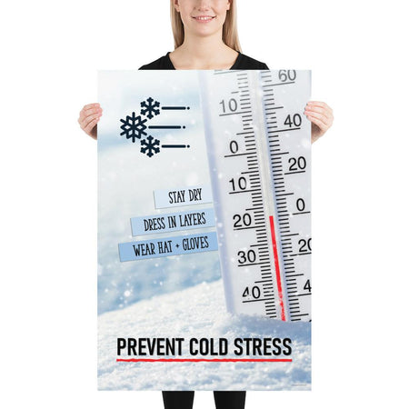 A safety poster showing a close-up of a thermometer stuck in the snow outside reading a freezing cold temperature with the slogan stay dry, dress in layers, wear a hat and gloves, prevent cold stress.
