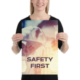 A safety poster showing a close-up of multiple gloved hands in a laboratory pouring substances into a beaker with the slogan safety first in the foreground.