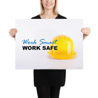 A safety poster showing a close-up of a yellow hard hat on a white background with the slogan work smart and work safe.