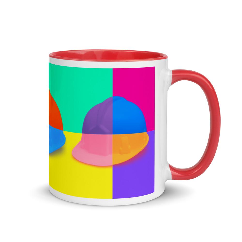 White ceramic mug with a bold hard hat pop art print with red color on the inside, the rim, and the handle.