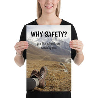 A workplace safety poster showing a close up of someone's feet wearing hiking boots with a mountainous landscape in the background with the slogan why safety? for the adventures ahead of you.