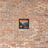 A safety poster showing a landscape of burnt orange tinted mountains with the sunlight piercing through the tops of the mountains with the quote our plans for the future descend from the past by Seneca.