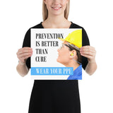 A safety poster showing a close-up of a worker wearing safety glasses, a hard hat, and earplugs with the slogan prevention is better than cure, wear your PPE.