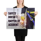 Safety poster that shows a construction worker wearing fall protection equipment with bridge in the background and a safety slogan in bold letters.
