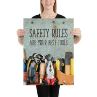 A safety poster showing various tools including screwdrivers, pliers, and wrenches laying on a worktable with the slogan safety rules are your best tools.