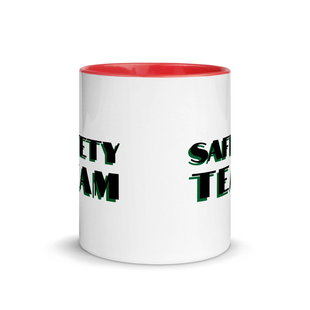 White ceramic mug with "Safety Team" in bold text across the side, with red color on the inside, the rim, and the handle.