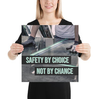 A workplace safety poster showing a close-up of a worker's hands grabbing panes of glass with gloves on with the slogan safety by choice not by chance.