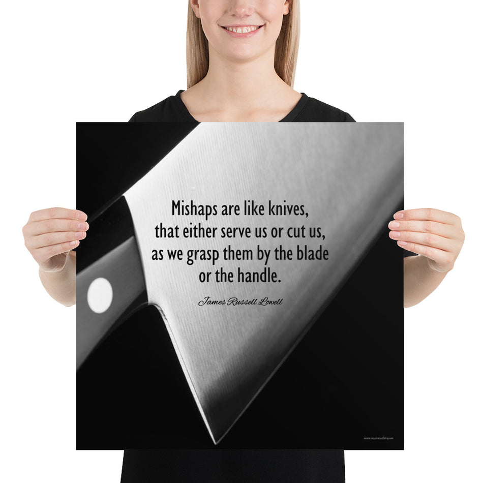 A safety poster showing an extreme close up of the base of a knife in black and white with a quote by James Russell Lowell that says "Mishaps are like knives, that either serve us or cut us, as we grasp them by the blade or the handle."