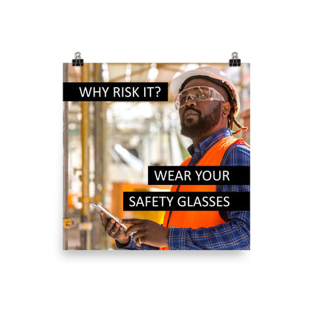 A safety poster showing a man in a reflective vest, hard hat, and safety glasses working with the slogan "Why risk it? Wear your safety glasses."