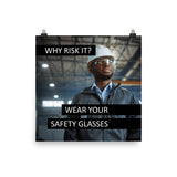 An eye safety poster showing a man in a white hard hat and safety glasses in a warehouse with the slogan "Why risk it? Wear your safety glasses."