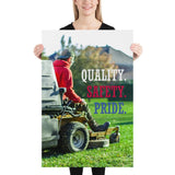 A workplace safety poster showing a man mowing a lawn on a sitting mower with the words quality, safety, pride in white, red, and blue, respectively.