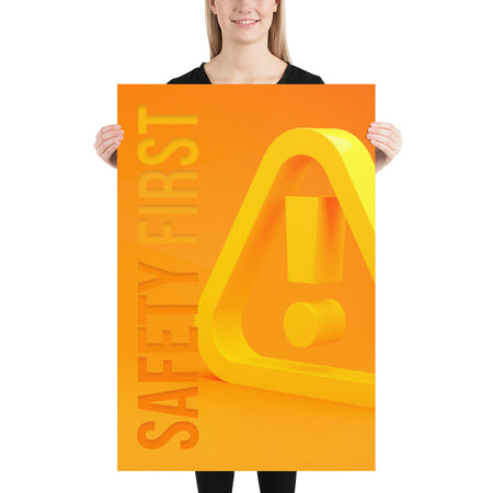 A safety poster showing a 3D looking  bright yellow hazard symbol with the slogan "Safety First."