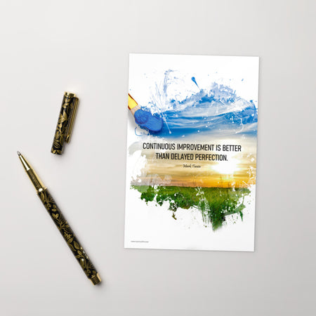 A mini print featuring a paintbrush sloppily painting a landscape with a quote by Mark Twain that says "Continuous improvement is better than delayed perfection."