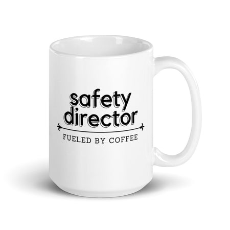 White ceramic mug with the phrase "Safety Director, fueled by coffee."